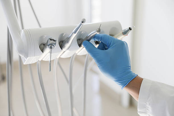 Professional Tooth Extraction technician working in Pulaski County County, IL